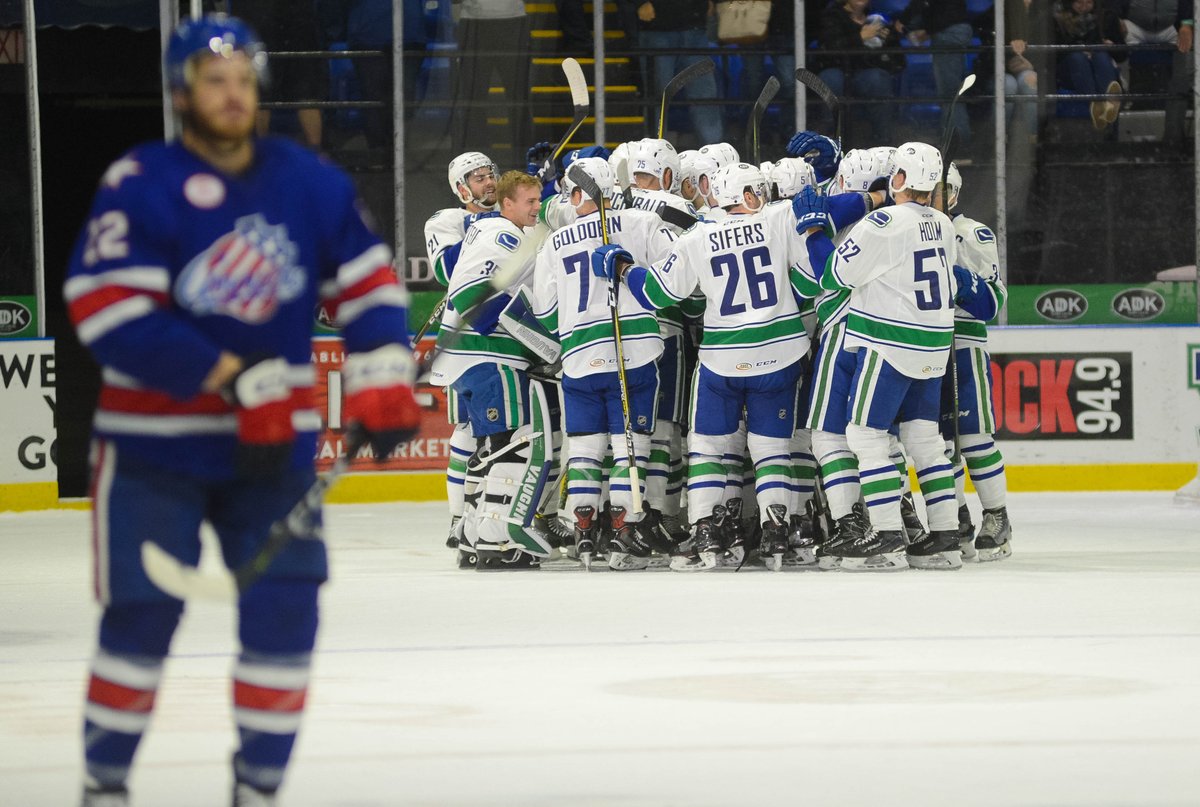 Utica Comets celebrate a win over the Rochester Americans in a shootout. Photo Credit: Utica Comets